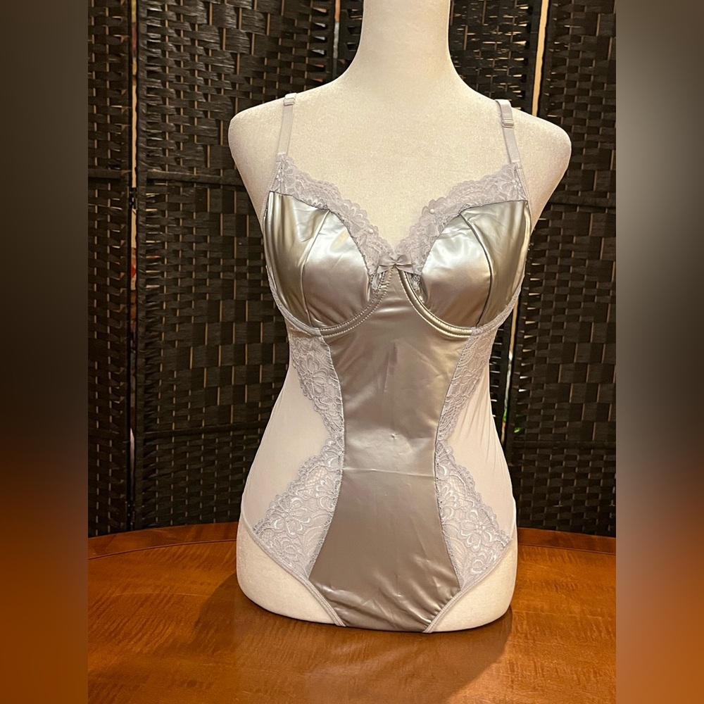 Silver metallic, lace and mesh bodysuit/ lingerie. Thong bottom, snaps. L. NWT